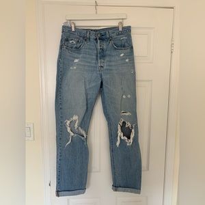 Levi’s 501 ripped mid wash jeans